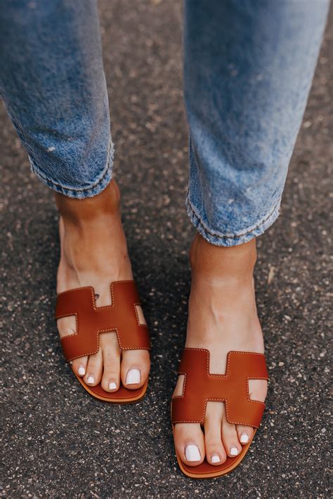 women wearing Hermes oran sandals